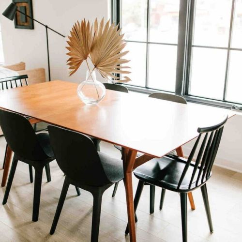 You can enjoy your meals together at the large dining table (seating for six), and this area also doubles as the perfect bright spot to get some work done.