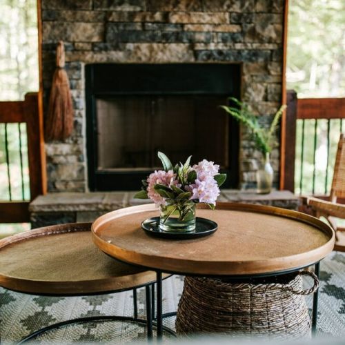 The cabin also provides its own outdoor sanctuary for guests to enjoy with main level porch boasting big views and an outdoor wood-burning fire place.