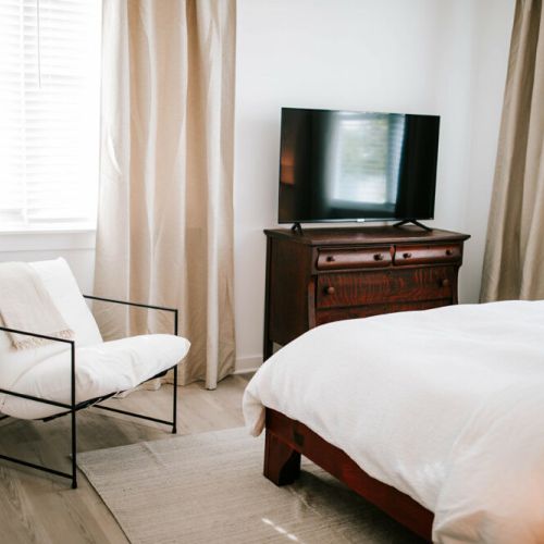Whether you're catching up on your favorite shows or unwinding with a movie night, our bedroom offers a cozy escape where comfort meets entertainment. Embark on a stay that balances leisure and tranquility