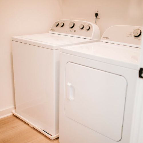 Laundry made easy! Make the most of your stay with the convenience of an in-unit washer and dryer. This snapshot showcases the modern amenities at your fingertips, ensuring you can pack light and stay fresh throughout your visit.