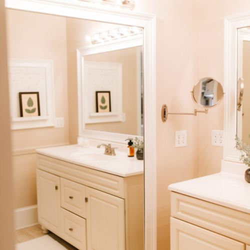 Reflect your style: this bathroom features a full-sized mirror, perfect for getting ready and adding a touch of elegance to your routine.