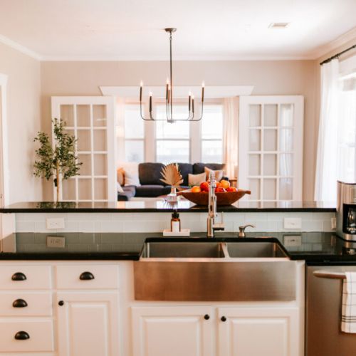 The full kitchen with farmhouse sink is sure to bring out your inner chef.