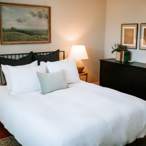 Each bedroom has a comfy queen-sized bed featuring a Purple mattress and organic cotton sheets.