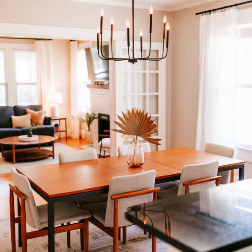 Seamless dining and living: this dining area is perfectly positioned across from the living area, creating a harmonious space for entertaining and relaxation.