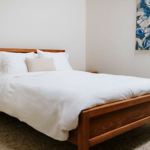 Each bedroom boasts comfortable queen sized mattresses with organic cotton linens.