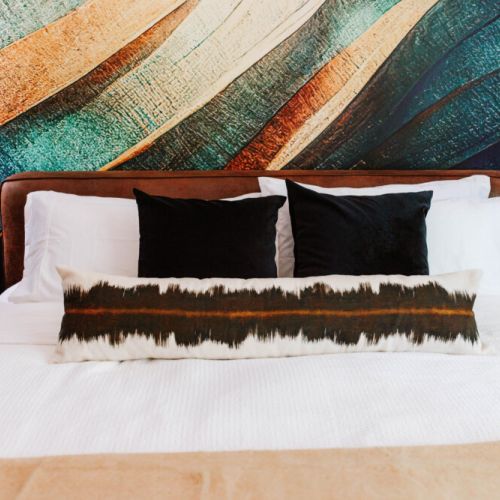 Drift into dreamland on a plush king bed framed by a stunning statement wall—where modern style meets boutique hotel vibes!