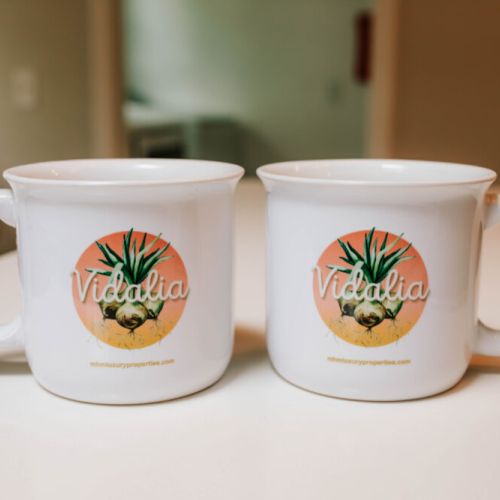 Cozy mornings start with coffee in our signature Vidalia mugs—part of your welcome gift and yours to take home.