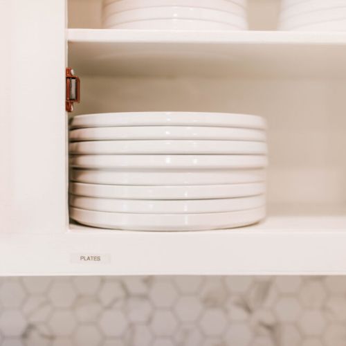 Neat, well-organized shelving highlights the kitchen’s thoughtful design.