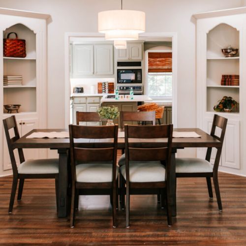Gather 'round and make memories! ✨ This warm and inviting dining space is perfect for shared meals, game nights, or morning coffee chats—just steps from a full-equipped  kitchen!