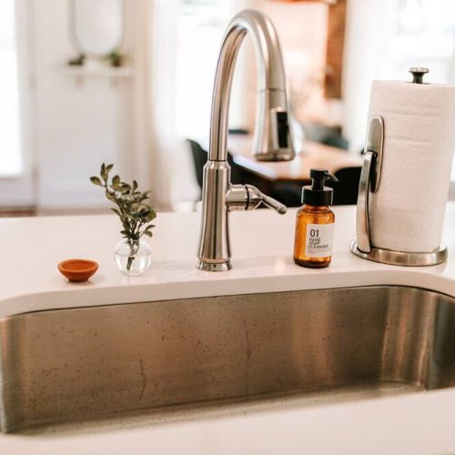 We love the inset stainless steel sink complete with garbage disposal to make clean up a breeze!