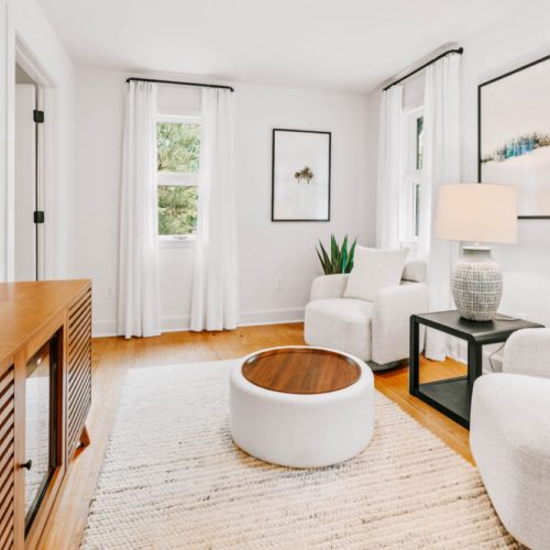 Bright, airy, and elegantly designed—this serene sitting area invites you to relax in comfort and enjoy a touch of modern luxury.