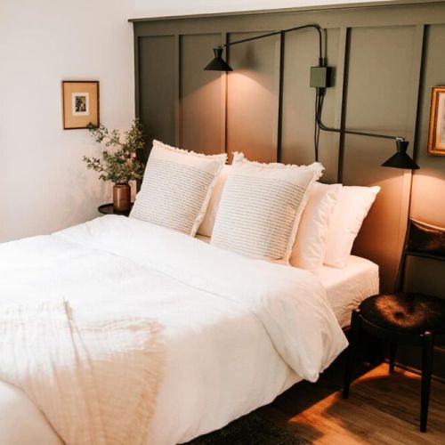 Guest bedroom with queen bed on second floor