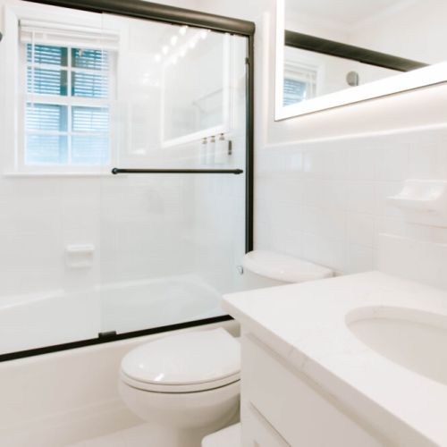 Bright, spotless spa vibes—freshen up in style and comfort.