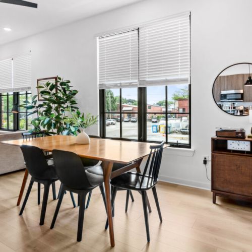 You can enjoy your meals together at the large dining table (seating for six), and this area also doubles as the perfect bright spot to get some work done.