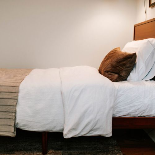 Sink into luxury with our fluffy pillows and high-quality linens in every bedroom, ensuring a comfortable and restful night's sleep.