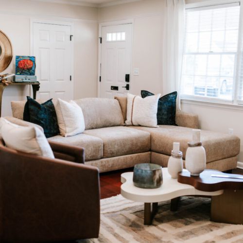 Bright, modern living room offering plush comfort and effortless luxury.