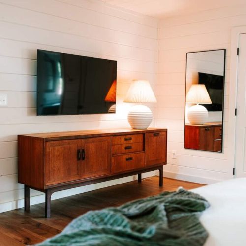 Primary Bedroom with large HDTV.