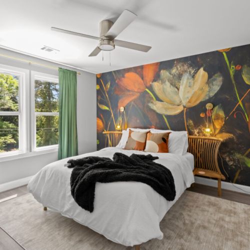 Wake up to bold blooms and golden-hour vibes in this artful bedroom retreat—where cozy meets creative in every corner.