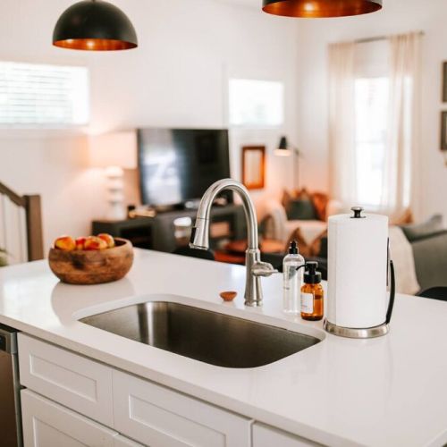 The kitchen island is any aspiring chef's dream workspace with lots of room for chopping, slicing, and cooking up a delicious meal!