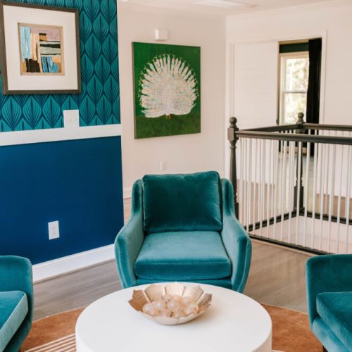 Chic meets cozy in this vibrant nook—perfect for morning coffee, deep convos, or your next Insta moment.