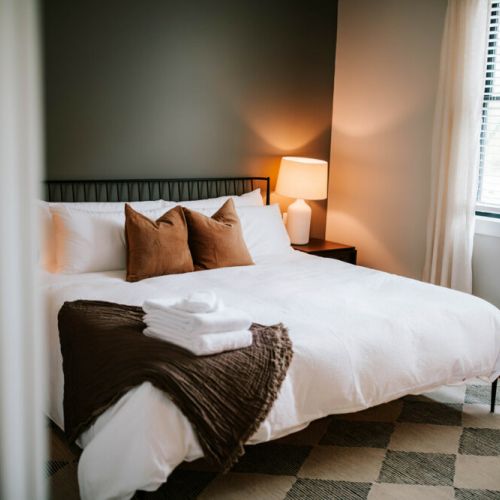 Sleep like royalty on our king-size bed with a comfy mattress.