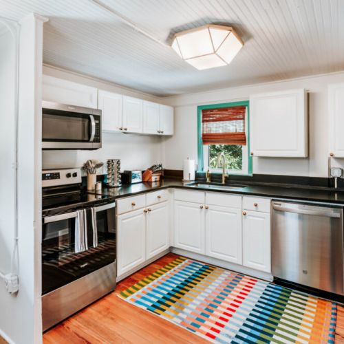 Cook, gather, and enjoy every moment. This bright, fully equipped kitchen makes it easy to prepare a family breakfast, share a home-cooked dinner, or linger around the counter with good conversation.