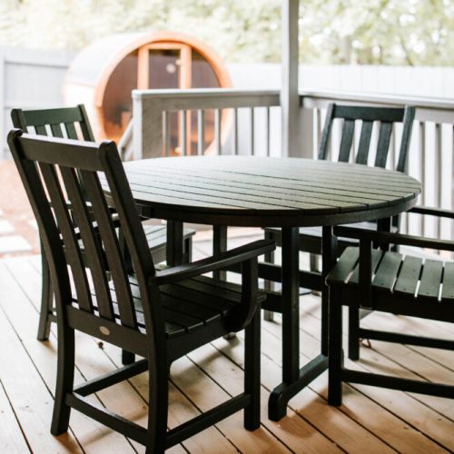 Cozy outdoor dining with peaceful views—ideal for shared meals and quiet moments.