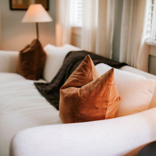 Sink into pure comfort on our plush, fluffy couch, perfect for relaxing and unwinding during your stay