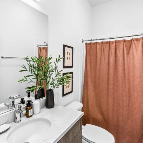 Enjoy a spa-like bathroom experience with premium toiletries and fresh touches to elevate your stay.
