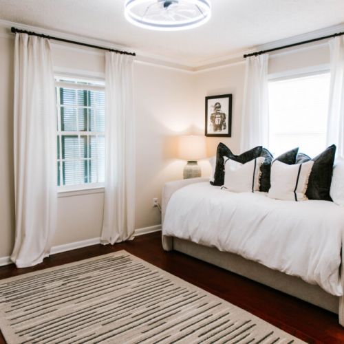 Soft light, stylish comfort—this relaxing room just feels good.