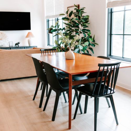You can enjoy your meals together at the large dining table (seating for six), and this area also doubles as the perfect bright spot to get some work done.