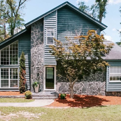 Welcome to your serene woodland escape — a bold blend of modern lines, natural stone, and forested charm, all nestled in the heart of nature.