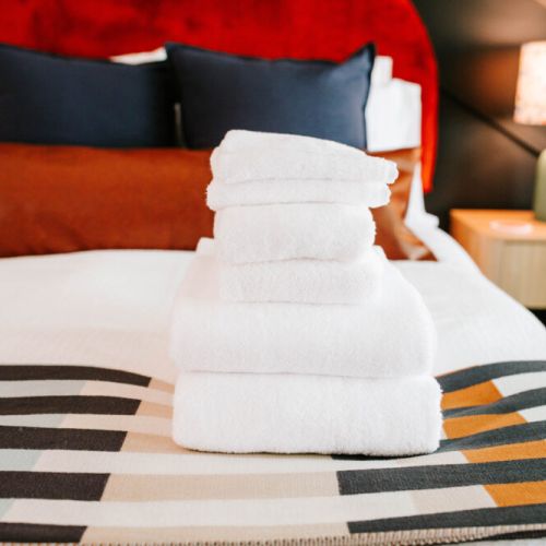 Start your stay wrapped in luxury—plush towels, pristine linens, and a bed that’s calling your name.
