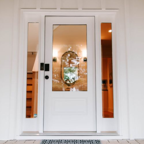 Step through this elegant entryway into a warm, stylish retreat where comfort and luxury welcome you at every turn.