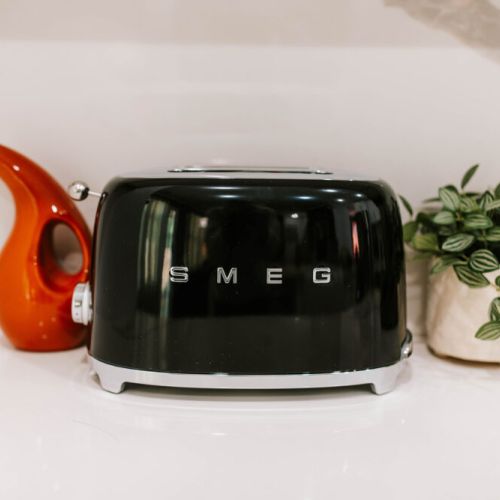 Start your day with style—our chic SMEG toaster is more than an appliance, it's a vibe.