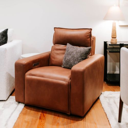 Sink into this comfy leather recliner—perfect for cozying up with a book, sipping wine, or simply unwinding in comfort and style.