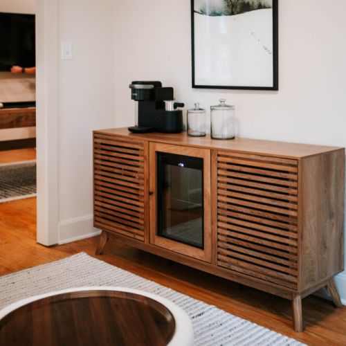 Enjoy a fresh cup of coffee or a chilled drink from the stylish beverage station—designed for both comfort and convenience during your stay.