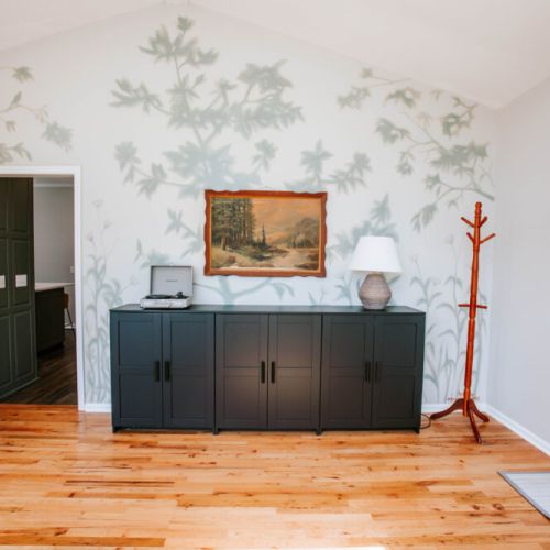 Our personal fave! Here's a hand-painted mural by talented local artist Meredith Raiford, bringing nature’s calm right indoors.