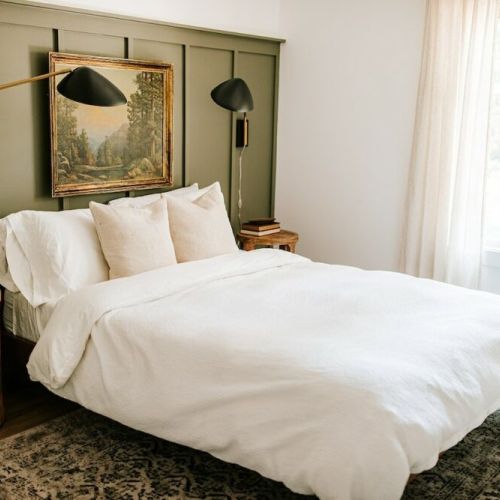 Rest and rejuvenate: the bedroom on the second level features a comfortable queen bed, providing a peaceful retreat for a restful night's sleep.