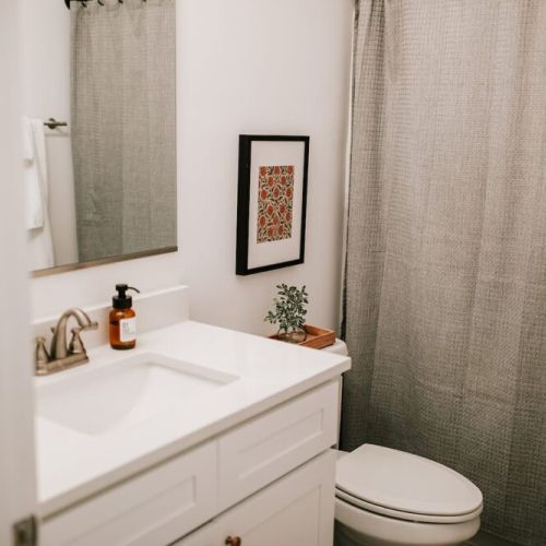 Modern comfort awaits: the second-floor bathroom is stocked with essentials, ensuring a refreshing and convenient stay for guests