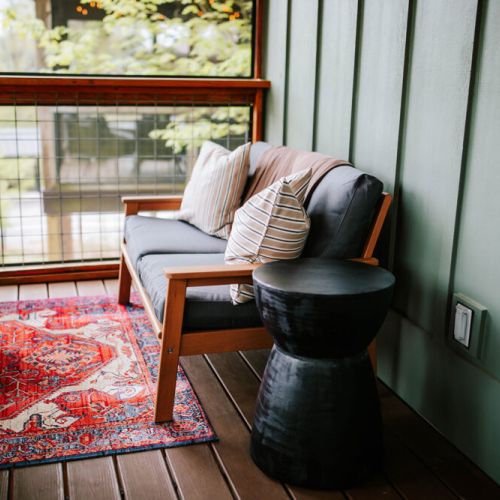 Our cabin offers its own outdoor sanctuary for guests. Breathe in the mountain air from the porche or unwind by the outdoor propane fire table. With ample seating areas, guests can sip morning coffee or enjoy a sunset drink. A large outdoor dining table invites al fresco meals.