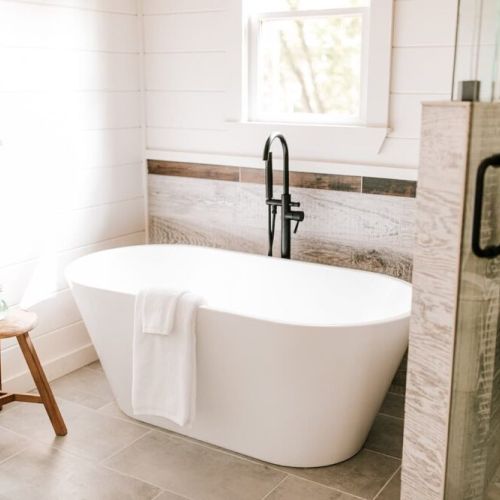 Primary Bathroom on Main Level. Just like the bedrooms, the bathrooms are made for ultimate comfort and relaxation. The main level has one full bathroom with a large soaking tub, a luxe walk-in shower, and dual sinks.