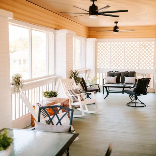 Screened in Porch with plenty of seating.