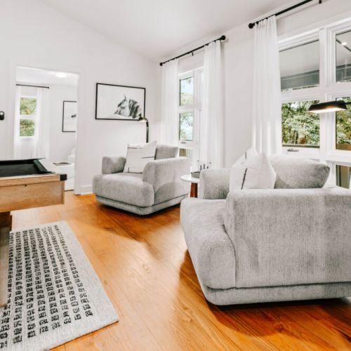 Sink into oversized armchairs and enjoy the bright, airy vibe — a perfect spot to unwind, read, or simply take in the serene views from the windows.