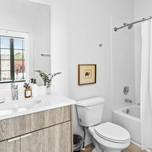 Each bedroom also has a private en-suite bathroom with tub/ shower combination. Each stocked with fresh towels, luxurious Public Goods toiletries (including shampoo, conditioner, lotion, and body wash), and hair dryers.