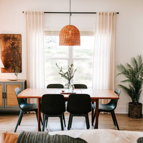 Dinning Area with table for six, three additional seats at the kitchen island.