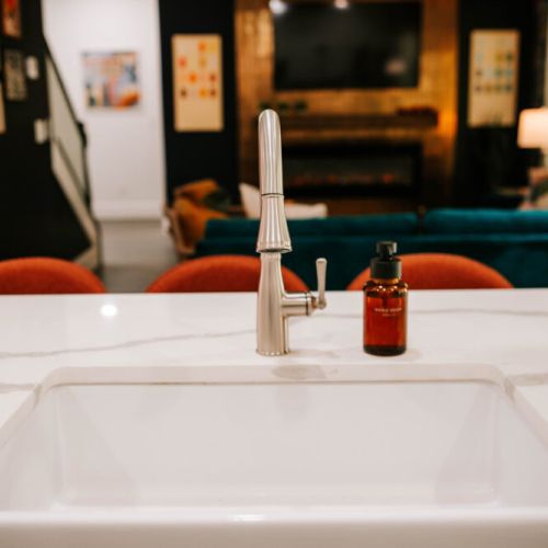 This modern sink is the heart of a designer kitchen—perfect for cooking, cocktails, or simply soaking in the vibes.