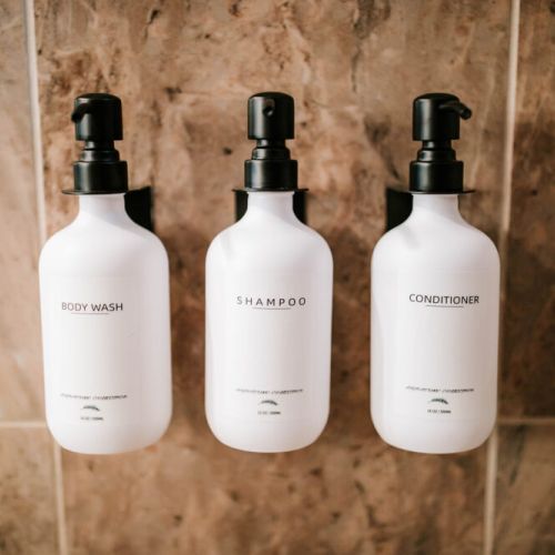 Indulge in comfort and convenience in our bathroom, stocked with spa-quality Public Goods amenities and plush towels for your ultimate relaxation.