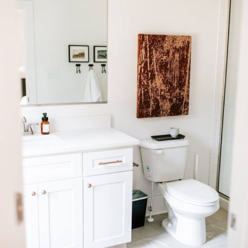 En-suite bathroom attached to the primary bedroom. Complete with walk in shower.
