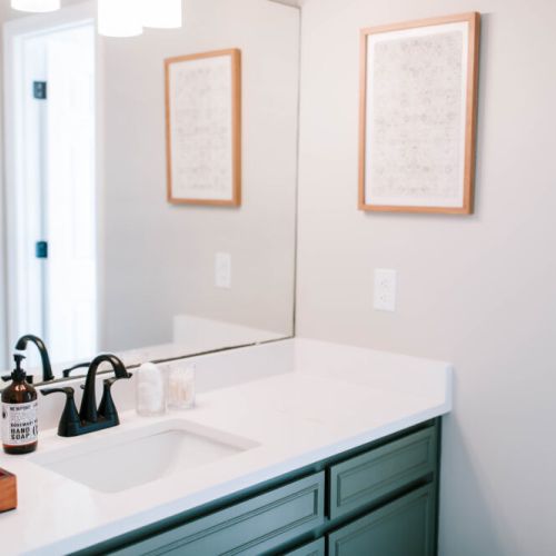 Each bathroom is stocked with fresh towels, luxurious Public Goods toiletries and hair dryer.